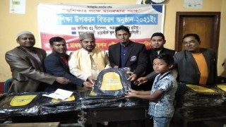 মাধবদীতে শিক্ষা উপকরণ বিতরণ