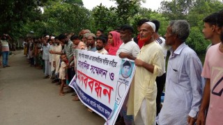 মাধবদীতে গৃহবধূ হত্যার বিচারের দাবিতে মানববন্ধন